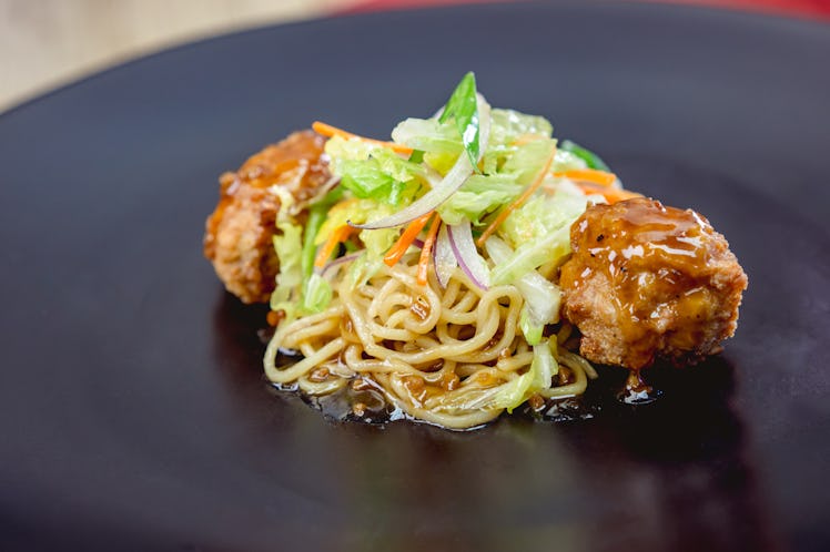 The chicken meatballs and lo mein noodles is served at Disneyland's Lunar New Year celebration. 