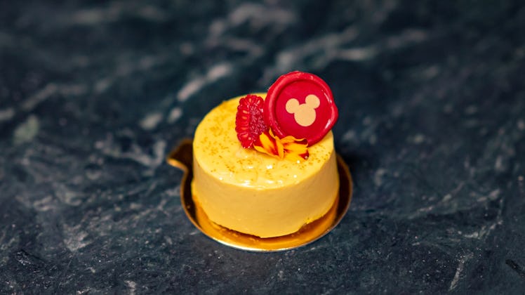 The Mango Mousse at Disneyland's Lunar New Year celebration has a Mickey Mouse decoration on top. 