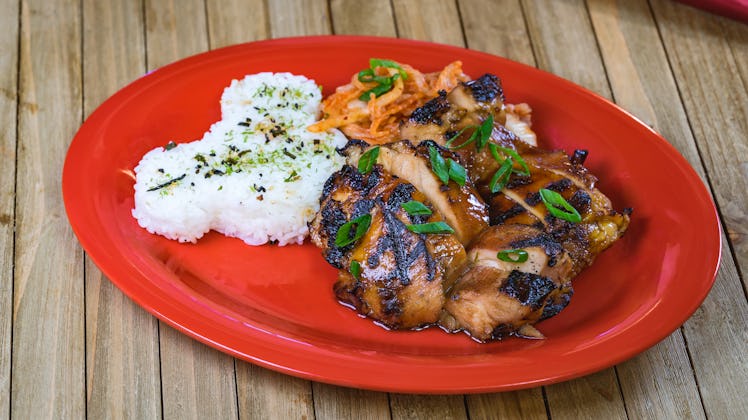 The Korean Grilled Chicken dish has Mickey Mouse-shaped rice and is served at Disneyland's Lunar New...