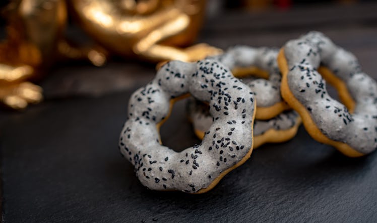 The black sesame mochi donut is served at Disneyland's Lunar New Year celebration. 