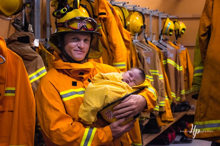 Australian firefighter holds newborn in now-viral photo