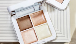 RMS Beauty's new Living Luminizer Glow Quad Mini featuring four highlighter and bronzer shades.