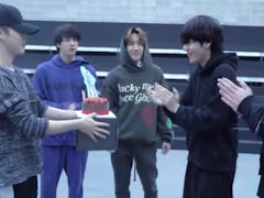 A screenshot from the video of BTS' surprise party for V's 24th birthday.