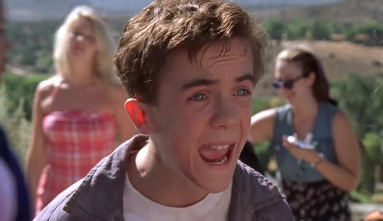 Malcolm from 'Malcolm in the middle' yelling with two women in the background