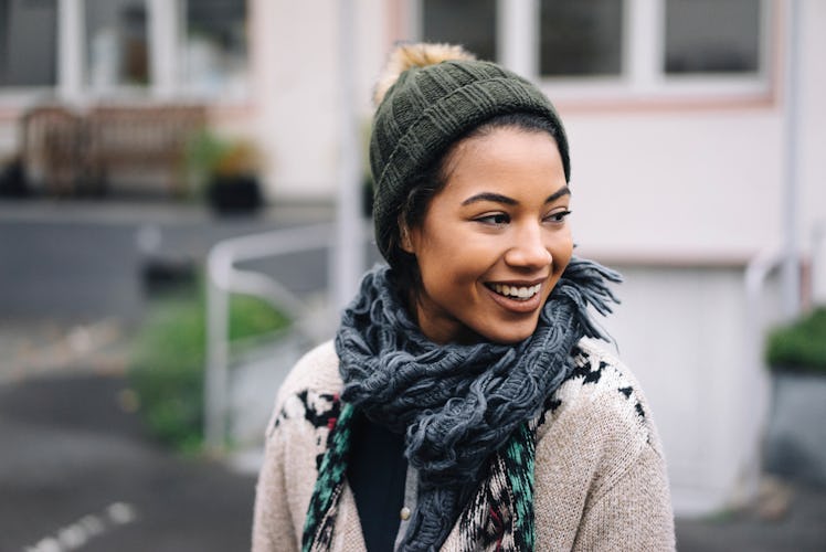 Young Black woman happy with scarf