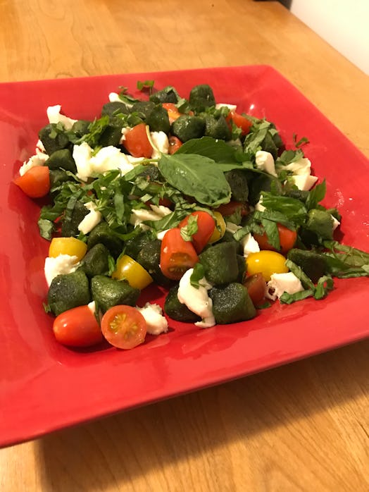 Trader Joe's Kale Gnocchi pairs well with mozzarella, tomatoes, and basil.