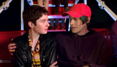 Lachlan Watson as Theo and Jonathan Whitesell as Robin in Chilling Adventures of Sabrina Part 3