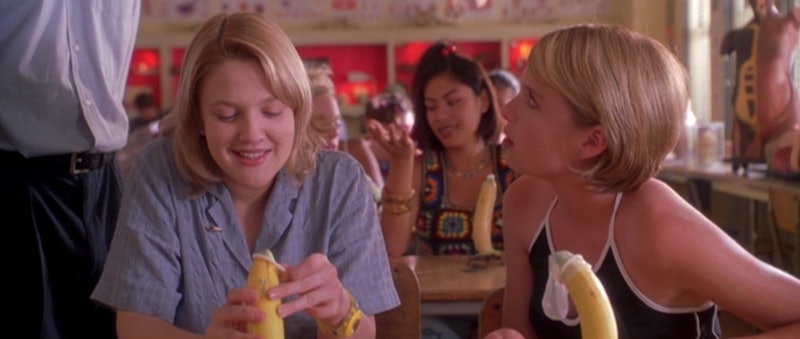 Screenshot of the film Never Been Kissed, where Drew Barrymore's character learns how to put a condo...