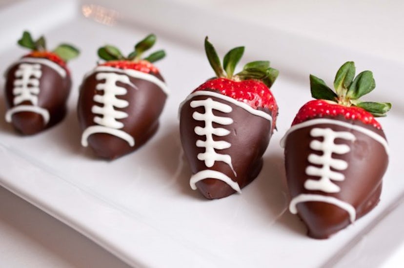 Chocolate-covered strawberry footballs are an easy Super Bowl dessert.
