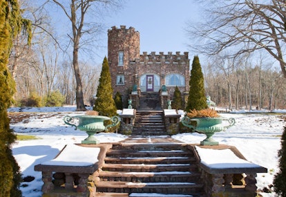 Snow covers a cozy castle in Connecticut that's listed on Airbnb. 
