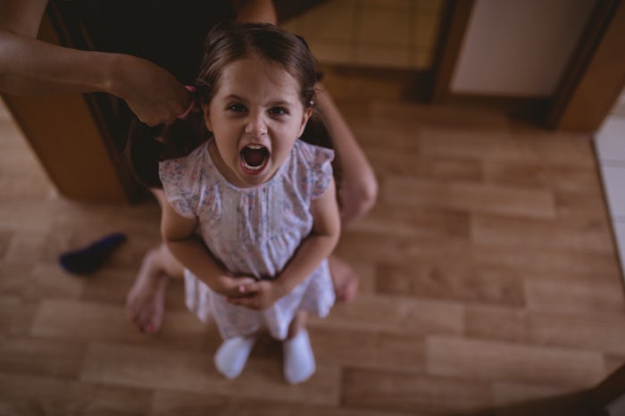 Little girl looking angry