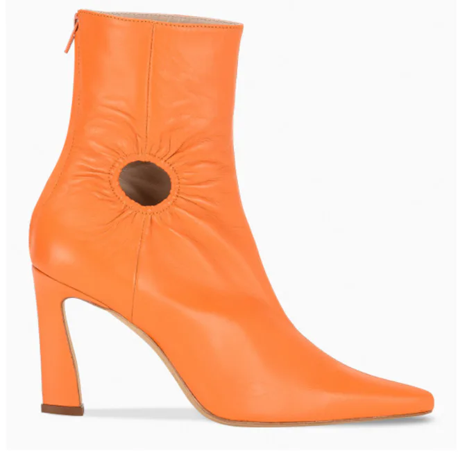 Orange Boot Invisible Gigi Hadid's Bright-Orange Boots Are An Easy Way To Embrace 2020's ...