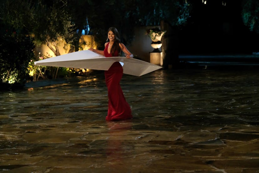 The Bachelor's Madison wore a paper airplane to meet Peter Weber.