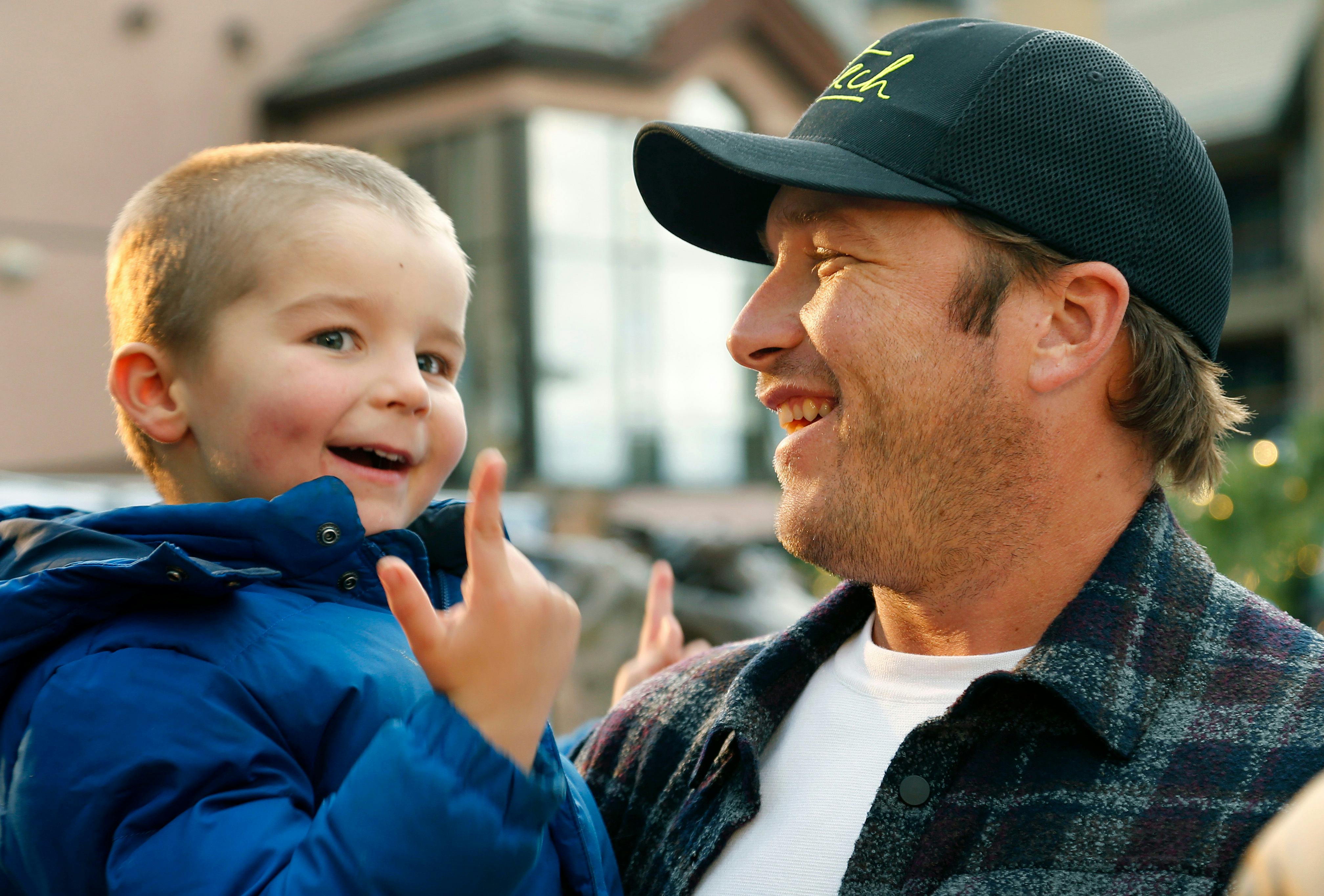 Bode Miller and his son. Miller lost a daughter to a drowning accident.