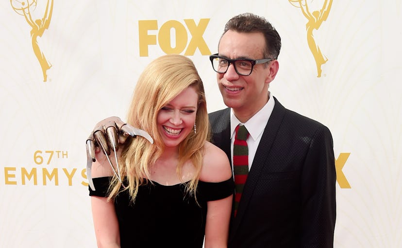 Natasha Lyonne and Fred Armisen with a Freddy Krueger hand and tie on the red carpet at the 2015 Emm...