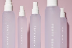 Fenty Beauty's new What It Dew Makeup Refreshing Spray in the bottle.