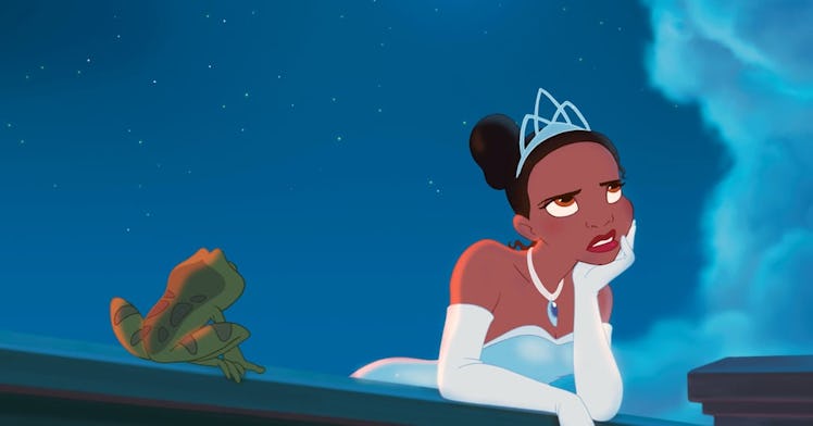 Tiana from 'The Princess and the Frog' looks up at the sky frustrated while the frog looks at her.