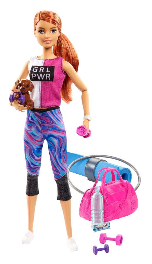 Fitness Barbie comes with plenty of accessories, too.