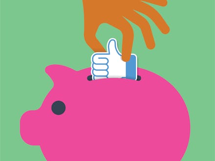 A hand placing a like button inside of a pink piggy bank