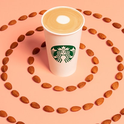 The new Starbucks Almondmilk Flat White features steamed almond milk, a Blonde espresso shot, and a ...