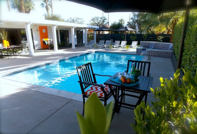 The pool in this Palm Springs home has lounge chairs for everyone to enjoy. 