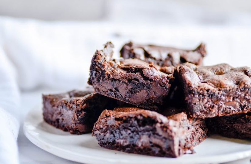 fudgy chocolate chunk brownies recipe from Something Swanky is a rich and flavorful dessert