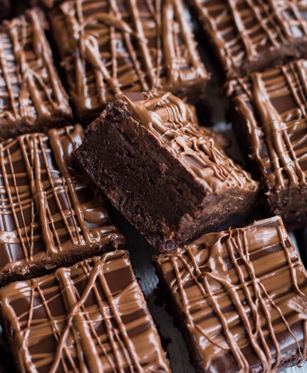 milk chocolate peanut butter truffle brownies recipe from Half Baked Harvest is super-simple and kid...