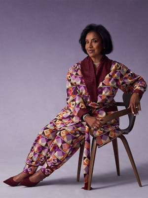 Phylicia Rashad posing in a Dapper Dan suit