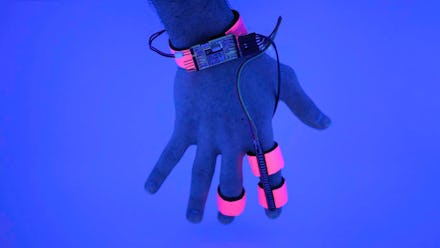 A hand equipped with the Dormio glove prototype.