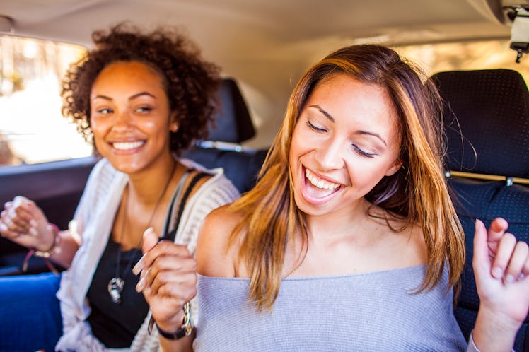 Sisters dancing in the fall