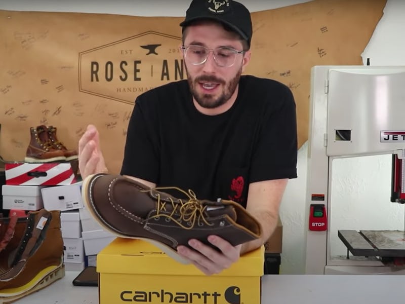 YouTuber Weston Kay on his channel reviewing a leather boot and then cutting it up.