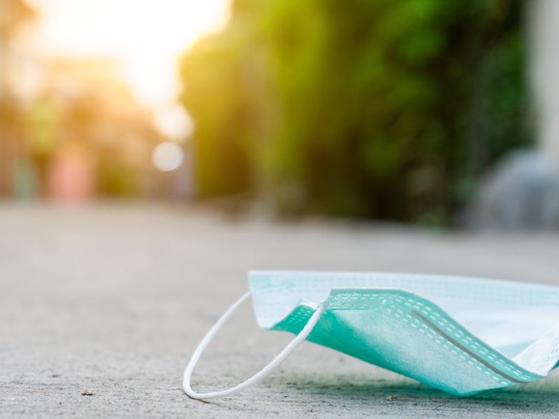 Face mask lying on the ground.