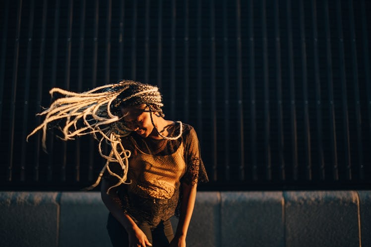 Young woman flipping her hair