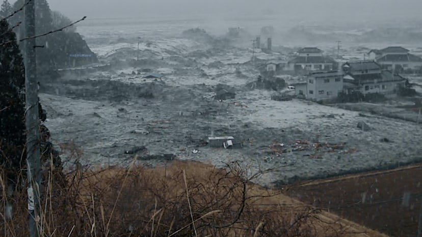 The 2011 tsunami hitting Ishinomaki in Japan in 'Unsolved Mysteries' in Volume 2 Episode 4, via Netf...