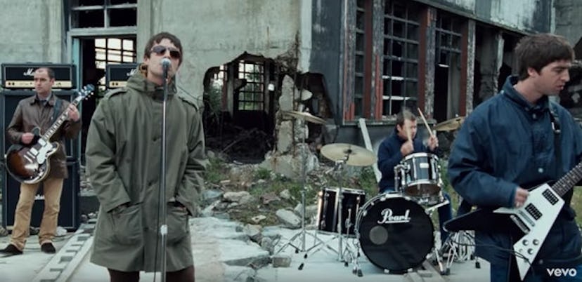 Oasis wearing parkas, performing in their music video