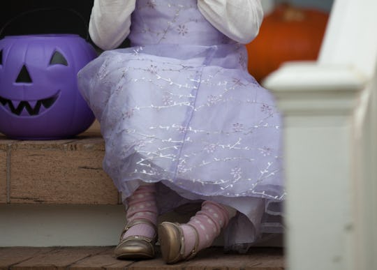 purple pumpkin on a porch