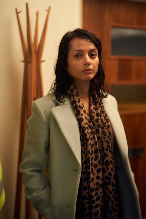 AMRITA ACHARIA as Holly Fox.