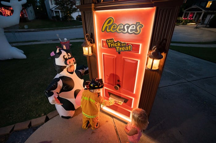 Reese's robotic trick-or-treat door offers fans of all ages a safe and no-contact means of enjoying ...