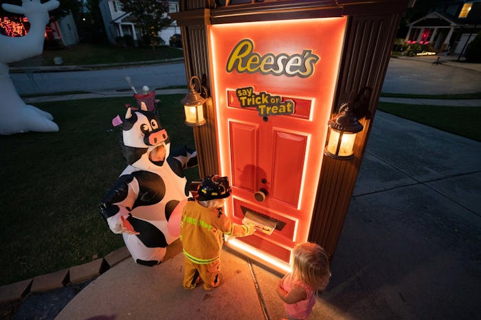 Reese's robotic trick-or-treat door offers fans of all ages a safe and no-contact means of enjoying ...