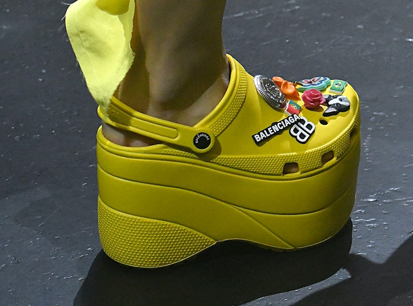 Yellow Balenciaga crocs with added platform