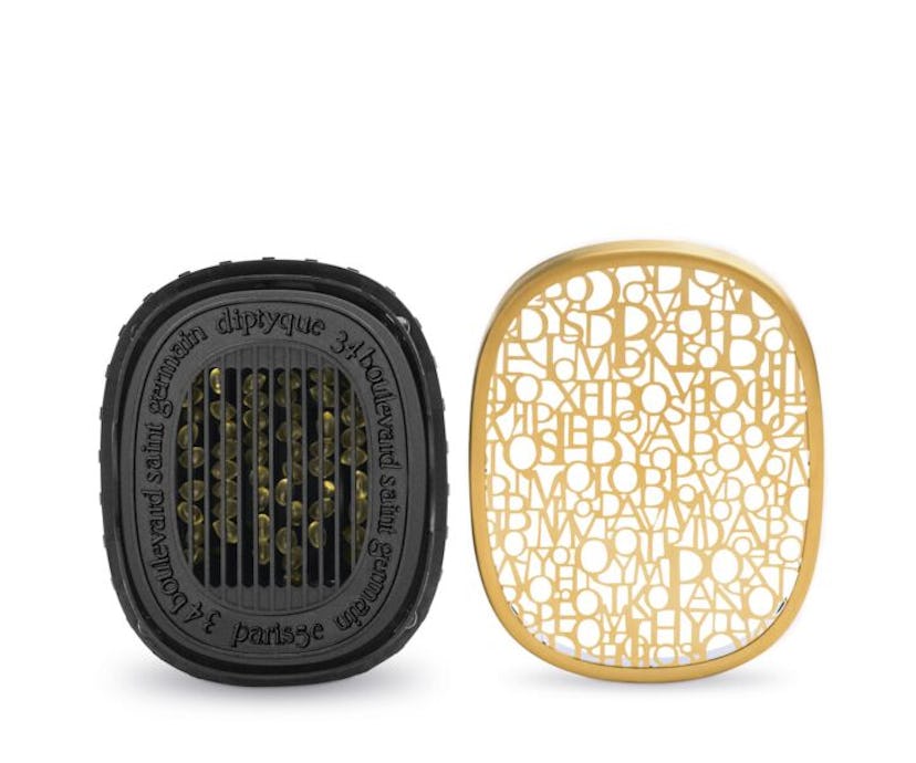 Diptyque electric wall diffuser in golden color