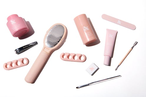 Olive & June Pedi System contents: nail polish remover, clean-up brush, and more.