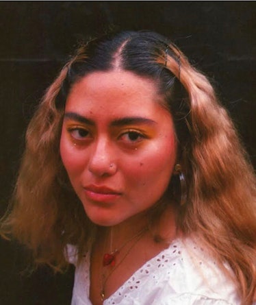 Nereida Ortiz, a DACA recipient, looks directly into the camera