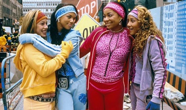Sabrina Bryan, Kiely Williams, Raven-Symoné, and Adrienne Bailon in tracksuits in "Cheetah Girls."