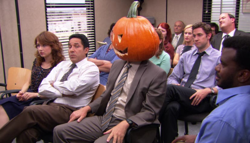 Dwight in a pumpkin head on The Office via a screenshot