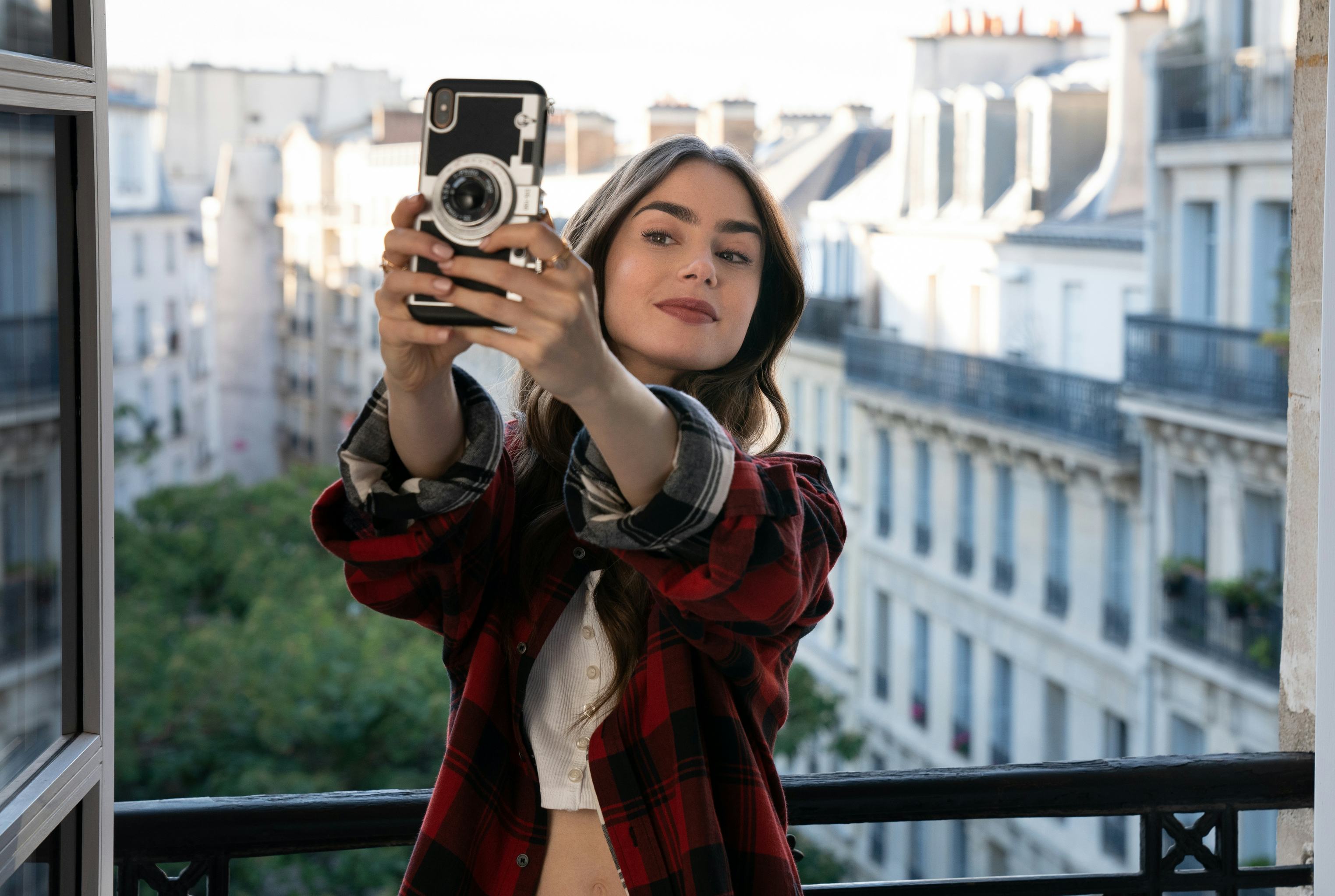 'Emily In Paris' Bucket Hats, Berets, & Handbags Are Spiking In Search
