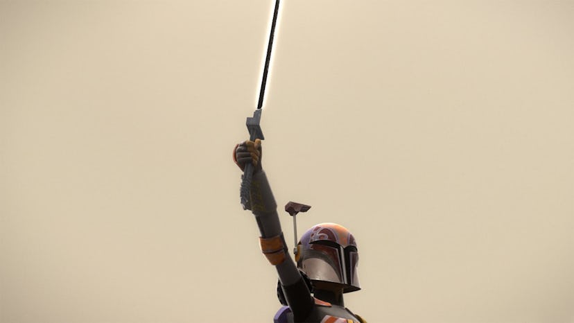 The Mandalorian Sabine Wren holds the Darksaber in an episode of 'Star Wars: Rebels.'
