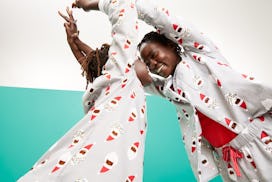 mother and child playing in Santa pajamas