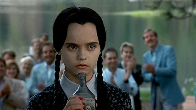 Wednesday Addams from "Addams Family Values" smelling poison.