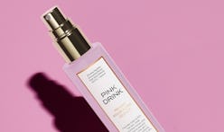 Sunday Riley Pink Drink Firming Resurfacing Essence close-up, in bottle.